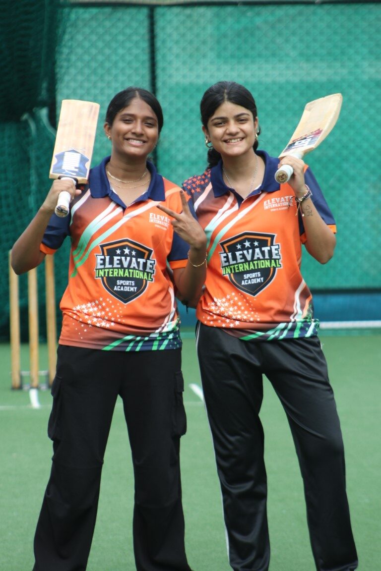 Female cricket player batting at Elevate International Sports Academy Female cricket player batting at Elevate International Sports Academy